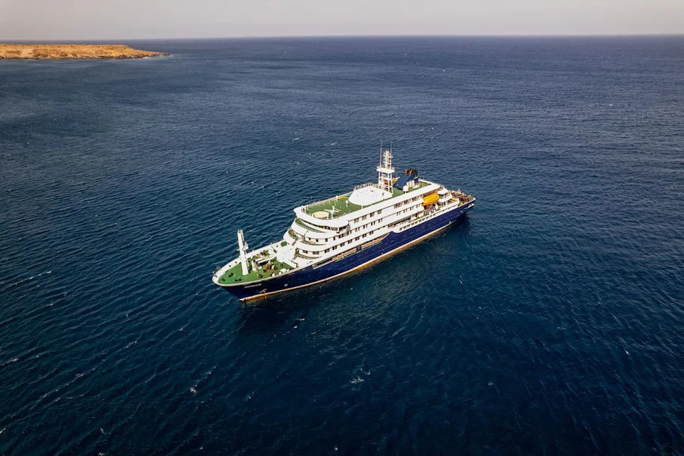 Aerial picture shows a general view of the cruise ship MV Hondius stationary off the port of Praia (AFP via Getty Images)