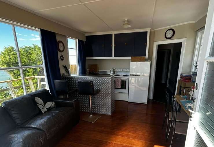 A two-bedroom crib on Kaika Road, in the Otago fishing village of Moeraki, attracted multiple offers. Photo / Supplied