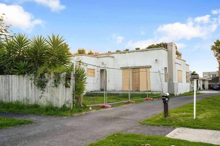 A fire-damaged house on Hoteo Avenue, in Papatoetoe, Auckland, is being sold
