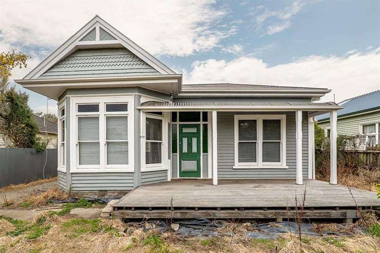 A three-bedroom villa on Corson Avenue, in Beckenham, Christchurch, was sold under the hammer for <img.305m, shattering expectations by more than $200,000. Photo / Supplied