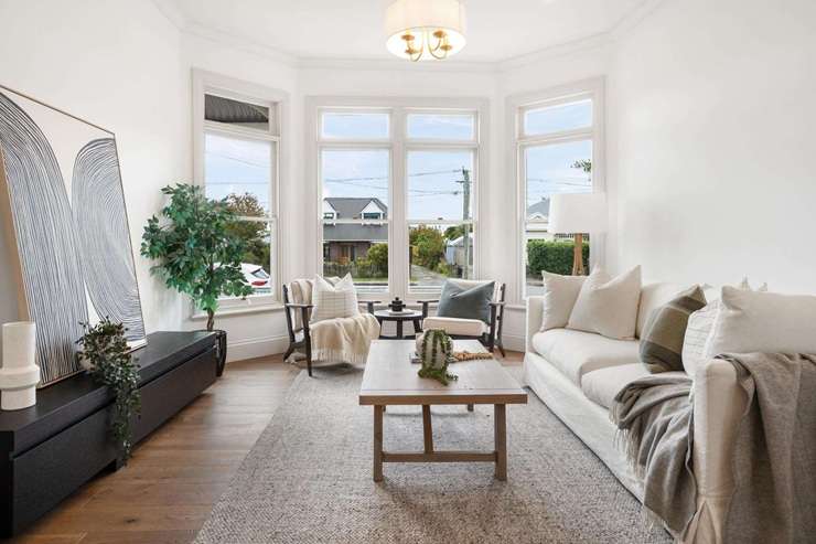 A three-bedroom villa on Corson Avenue, in Beckenham, Christchurch, was sold under the hammer for <img.305m, shattering expectations by more than $200,000. Photo / Supplied