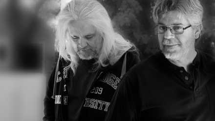 A black-and-white author portrait of Ty Franck and Daniel Abraham, who write together under the name 