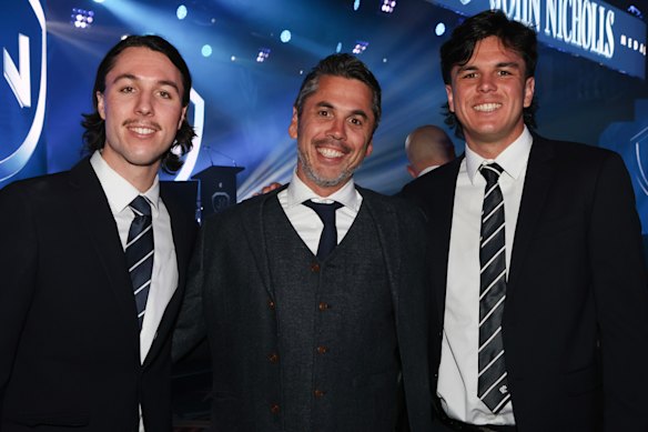 Former footballer Ben Hollands (centre) with sons Ollie (left) and Elijah (right) at the 2025 Carlton club championships.