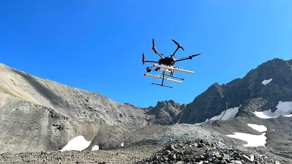 A drone above a rocky area.