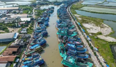 Fshing boats docked ashore at a port in Juwana, Central Java on May 6.