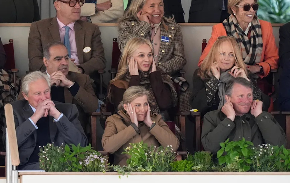 The Duchess of Edinburgh (centre) reacts as members of the King's Troop, Royal Horse Artillery fire their guns during the Royal Windsor Horse Show (PA)