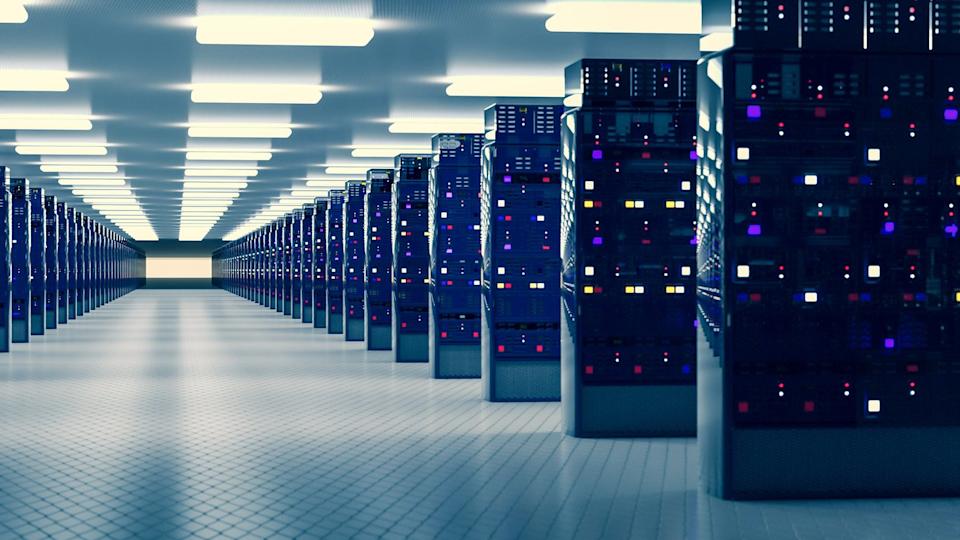 Rows of computer servers in a large data center.