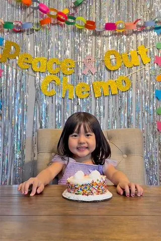 Lola Xiong celebrating end of chemoCredit: Kristine Xiong