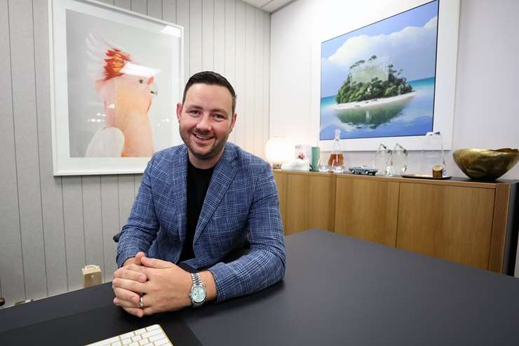 Ray White Auckland agent Jared Cooksley is celebrating 10 years as a business owner. He bought the agency's Mount Eden office when he was 25. Photo / Fiona Goodall