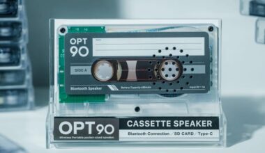 Transparent display of an OPT90 cassette speaker in a clear case, with