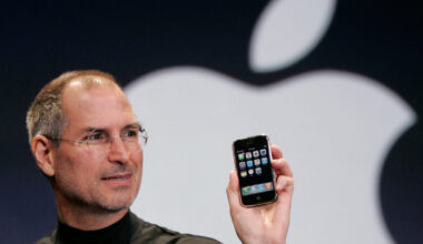 FILE - Apple CEO Steve Jobs holds up an Apple iPhone at the MacWorld Conference in San Francisco on...