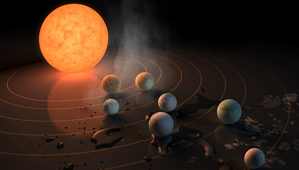 This artist’s impression displays TRAPPIST-1 and its planets reflected in a surface. The potential for water on each of the worlds is also represented by the frost, water pools, and steam surrounding the scene. © NASA/R. Hurt/T. Pyle
