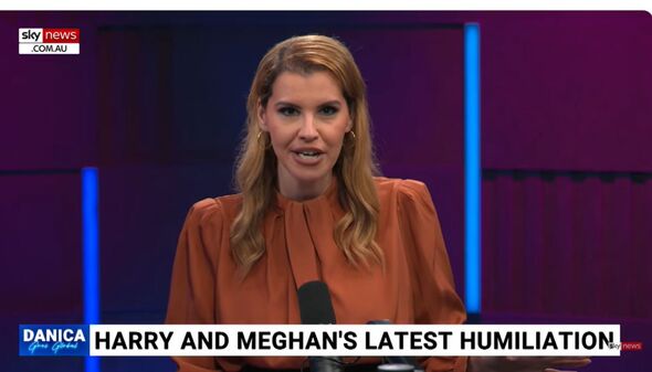 Close up of Danica De Giorgio presenting on Sky News with a banner saying "Harry and Meghan's latest humiliation" at the bottom of the screen Close up of Danica De Giorgio presenting on Sky News with a banner saying "Harry and Meghan's latest humiliation" at the bottom of the screen