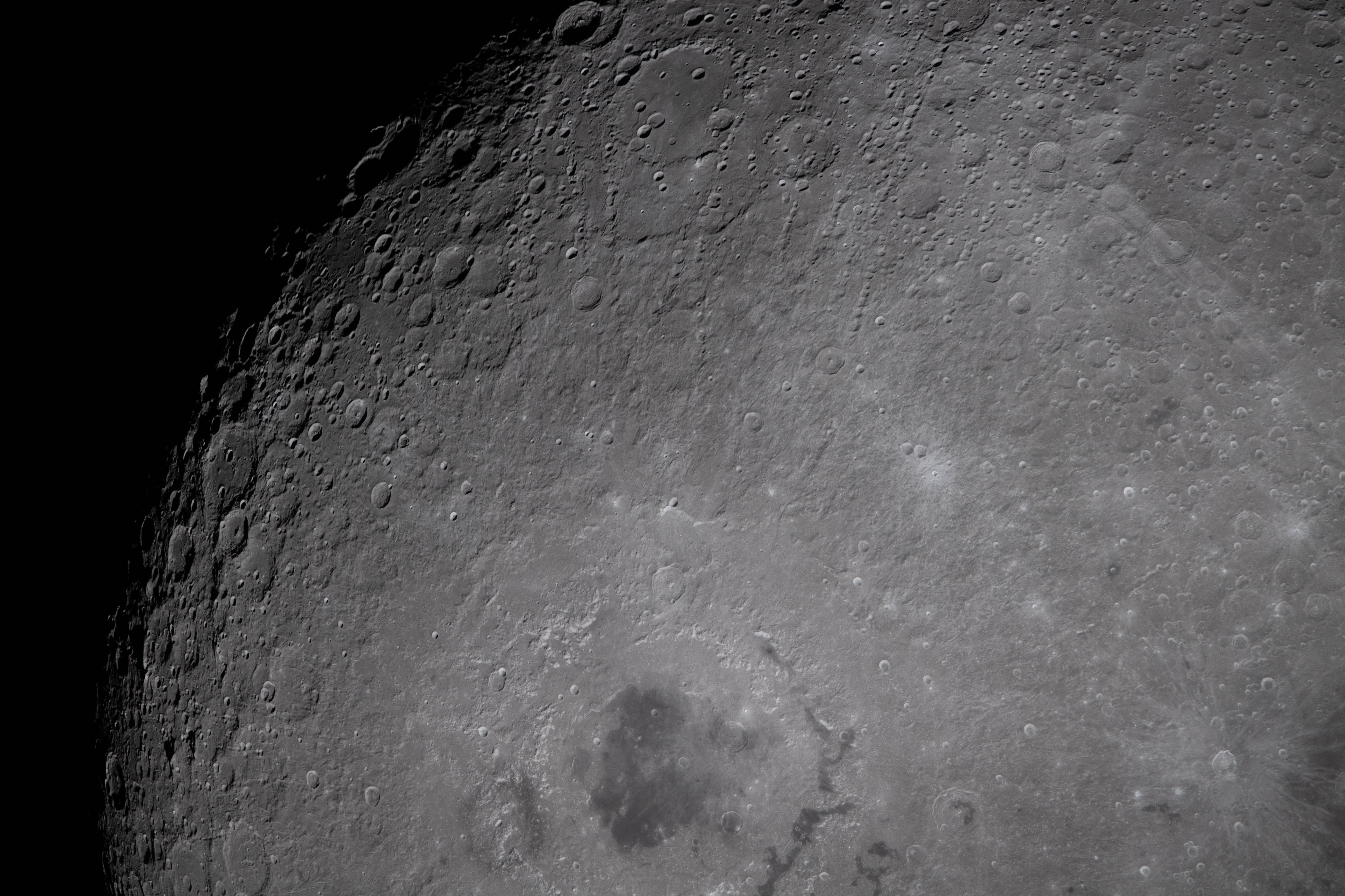 zoomed in view of craters on the lunar surface