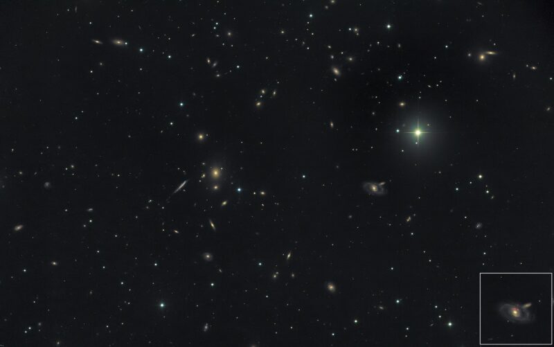 Fifty small and nebulous objects overlaid with a sparse background of stars, with an inset at the lower right.
