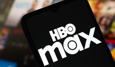 The HBO Max logo is seen displayed on a smartphone screen.