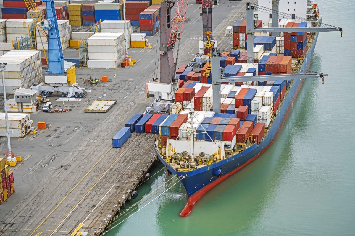 Container ship unloading at port