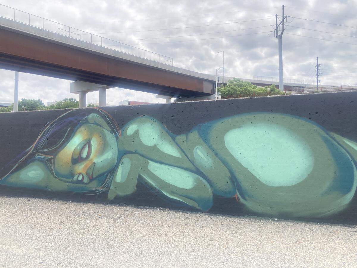 Over Memorial Day weekend in 2026, Mo River Murals Fest, 100 graffiti artists taking part in the Mo River Murals Fest gathered along the Riverfront Heritage Trail to paint 40-foot sections of the river’s flood wall covering over 1.5 miles.
