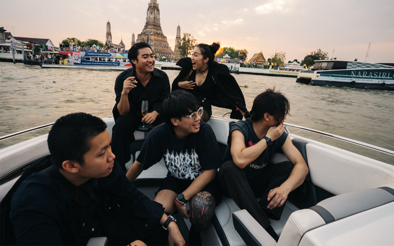 Defying Decay smiling on a boat