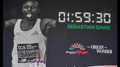 Kenyan marathon record-breaker Sabastian Sawe (left) delivers a speech in Nairobi. (AP)