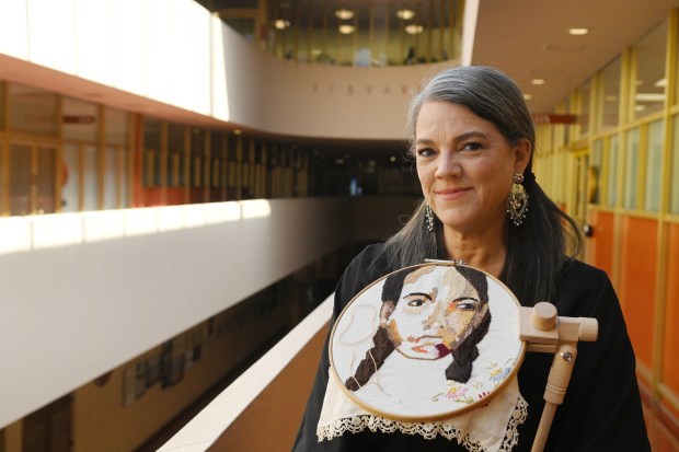 County employee Juliet Schiller holds her self-portrait at the Marin County Civic Center in San Rafael, Calif., on Monday, May 18, 2026. (Alan Dep/Marin Independent Journal)