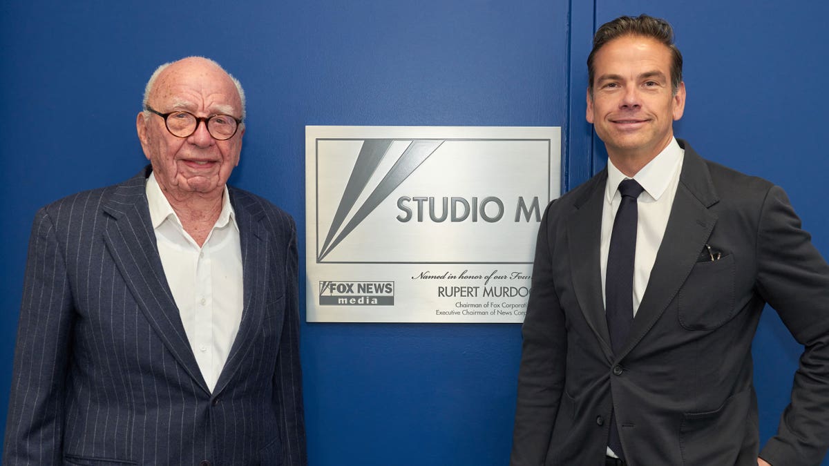 Rupert Murdoch and Lachlan Murdoch standing together