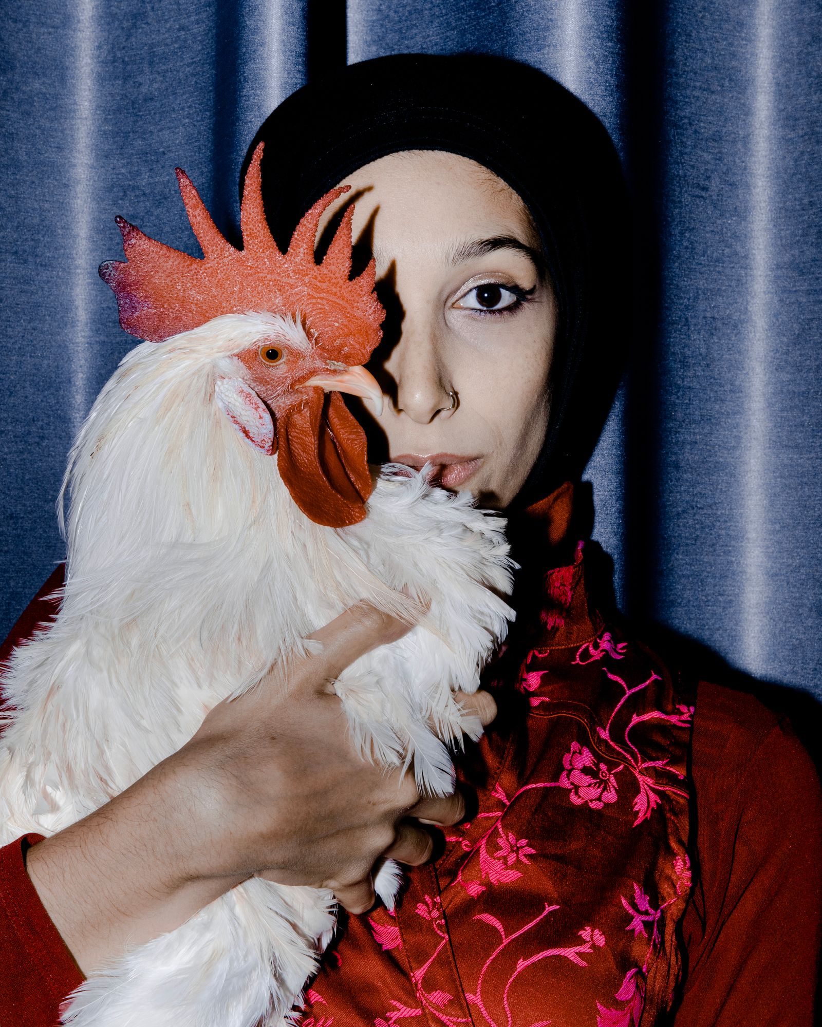 Image may contain Emily Atef Adult Person Face Head Photography Animal and Bird