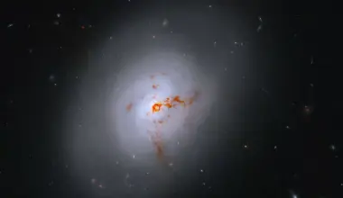 Hubble reveals rare galaxy transformed by black hole activity