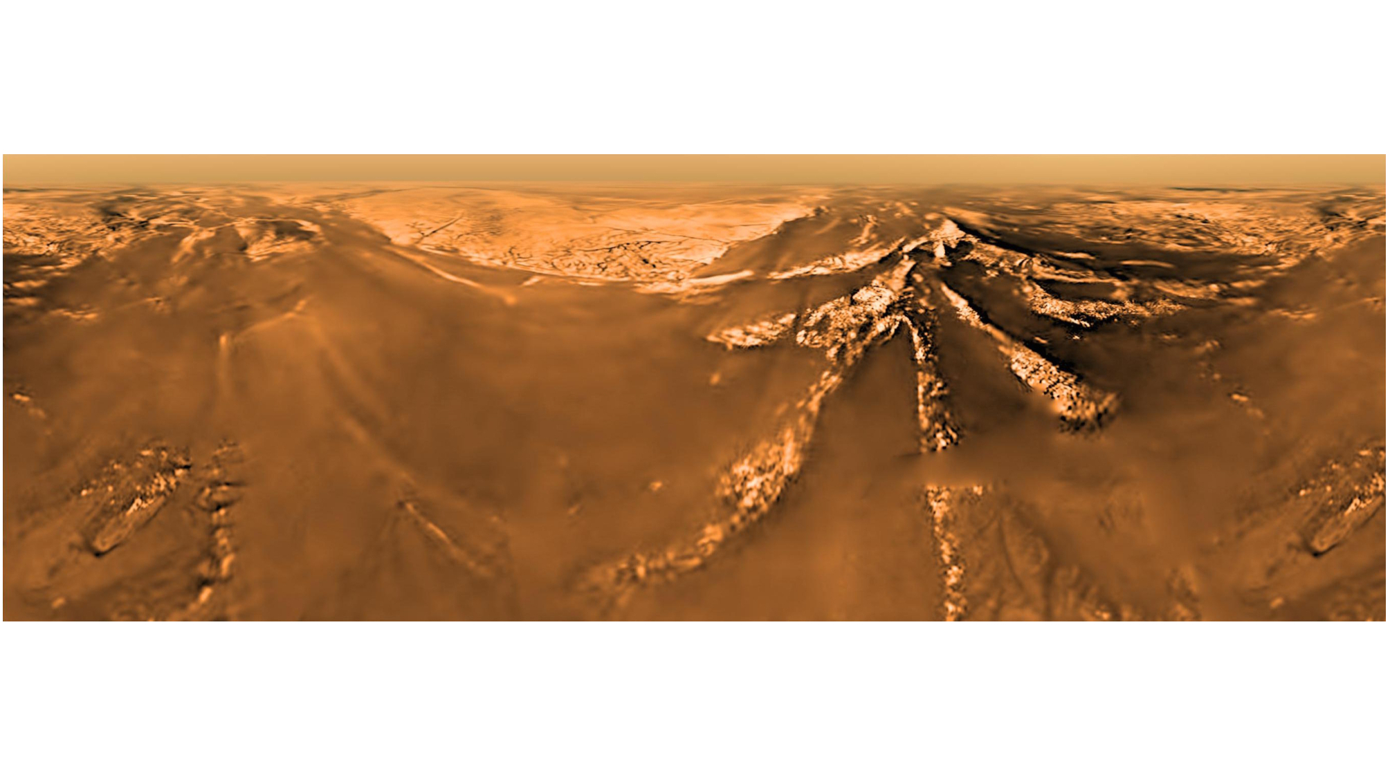 view of brownish mountains on an alien world, taken from the sky by a descent probe