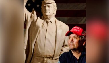 Steven C. Barber stands in front of the clay version of what would become the statue of President Donald Trump that he commissioned.