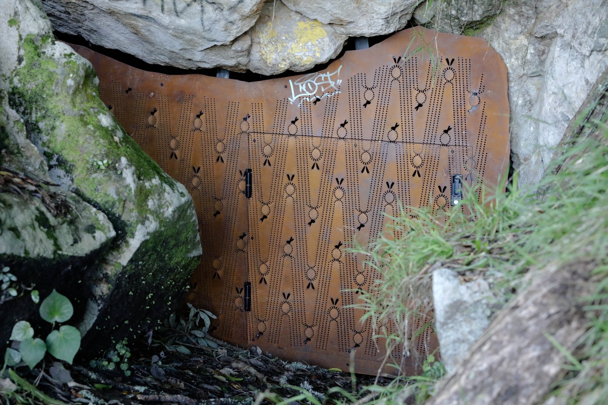  The corten steel panels sealing the caves also include gated access for maintenance and rubbish removal. Photo / Kelly O’Hara