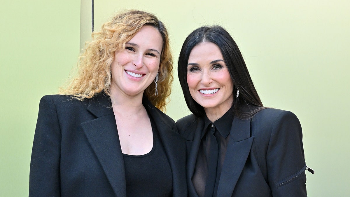 Rumer Willis and Demi Moore smiling together at Versace FW23 Show in West Hollywood