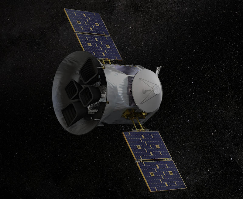 Hollow cylindrical satellite in space with 2 large blue and gold solar panels.