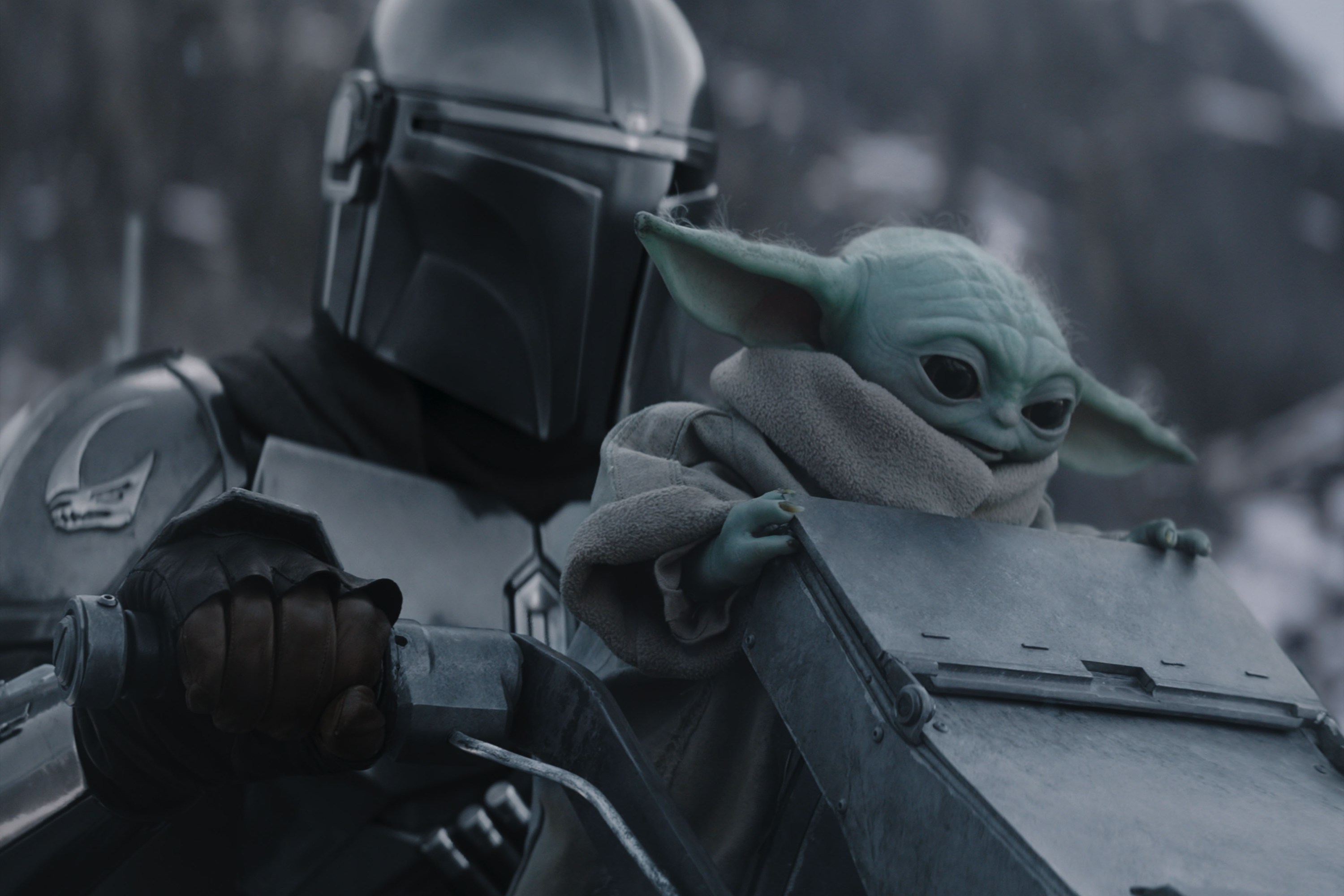 (L-R) The Mandalorian and Grogu in Lucasfilm's THE MANDALORIAN AND GROGU. Photo courtesy of Lucasfilm. © 2026 Lucasfilm Ltd™. All Rights Reserved.