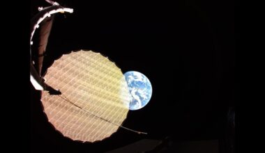 Earth photobombs a satellite deploying its giant reflector photo of the day for May 14, 2026
