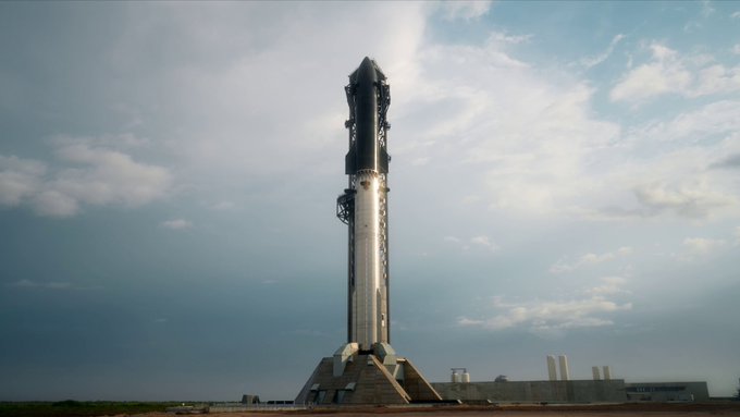 SpaceX Starship Flight 12 stands atop launch pad before May 2026 test flight under cloudy skies