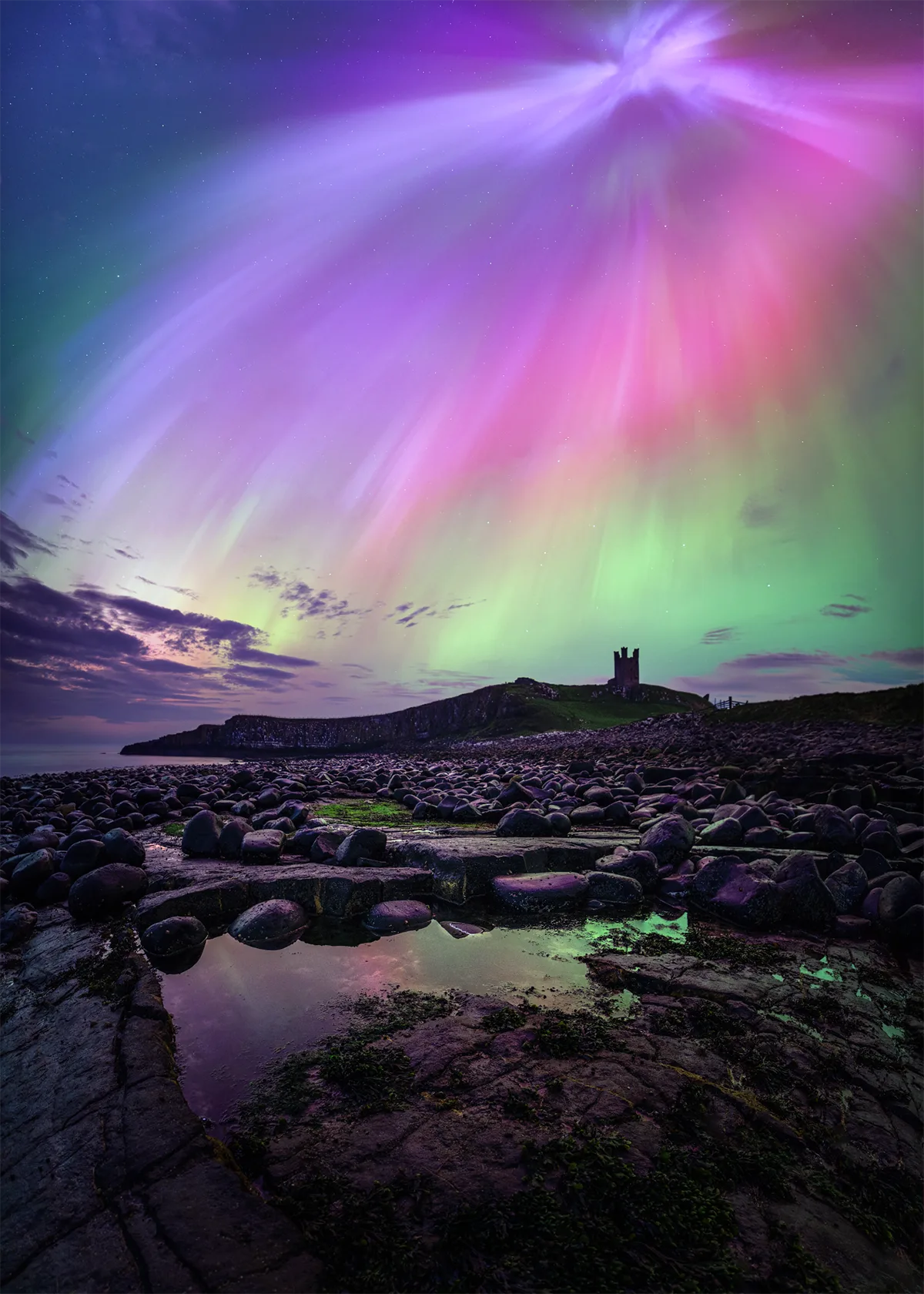'Raining Down On Dunstanburgh Castle' by Peter Greig came third place in the Astronomy Photographer of the Year People's Choice Award 2026