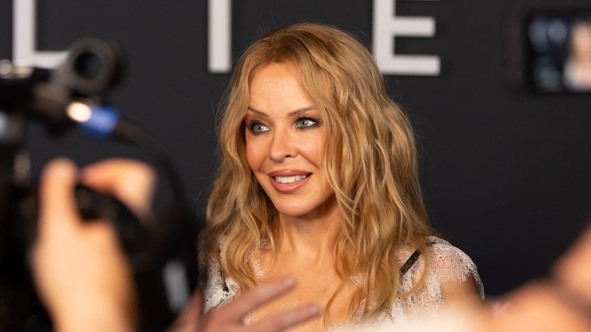 Kylie Minogue says 2021 cancer diagnosis was kept secret from fans