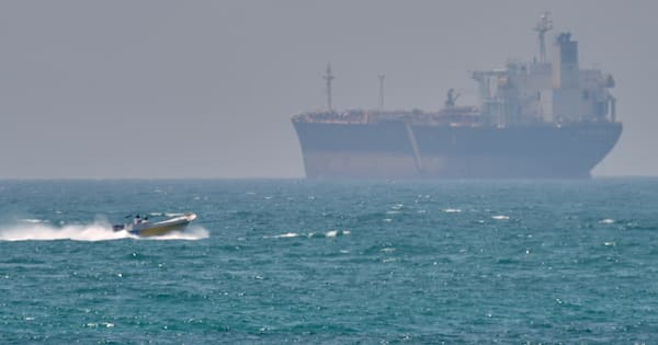Ship attacked near Strait of Hormuz as Iran reviews US response to proposal