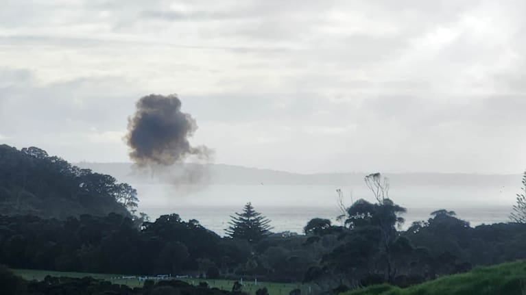 A cloud of smoke pictured over Long Bay Beach this morning.