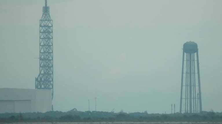 A lightning arrester and a charred water tower are seen at pad 36 in the aftermath of the Blue Origin New Glenn rocket explosion at the Cape Canaveral Space Force Station, Friday, May 29, 2026, in Cape Canaveral, Florida.