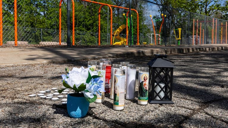 A makeshift memorial set up at the scene of a double homicide outside Southwest Elementary School in Grand Rapids, Michigan, Wednesday, May 6, 2025. 