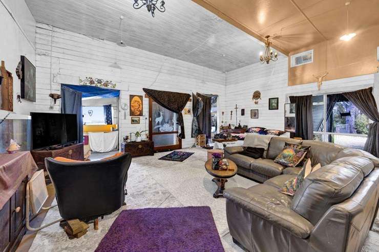 Janine and Brian Jones sold their colourful home for over $545,000 after five years of renovation and restoration work. Photo / Supplied