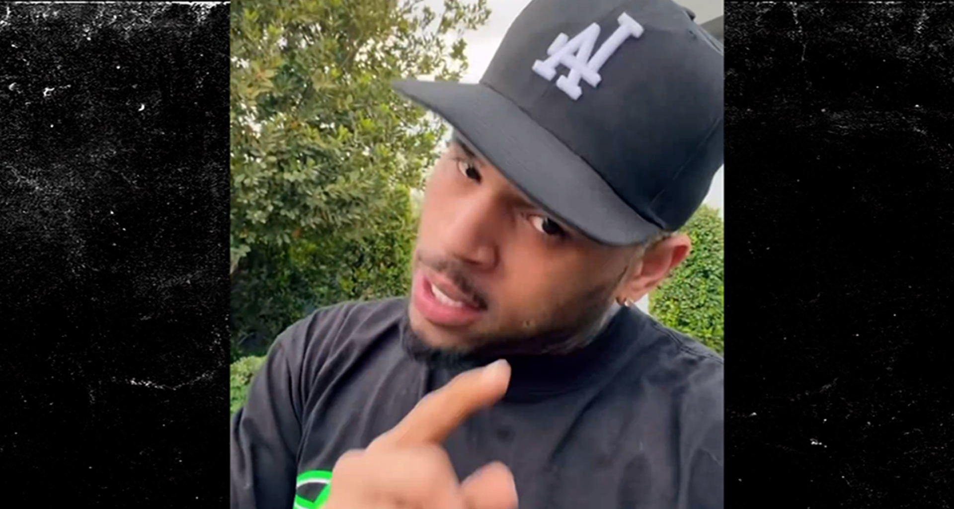 Chris Brown Says He's Going to Beat Up Haters After Scathing Album Review