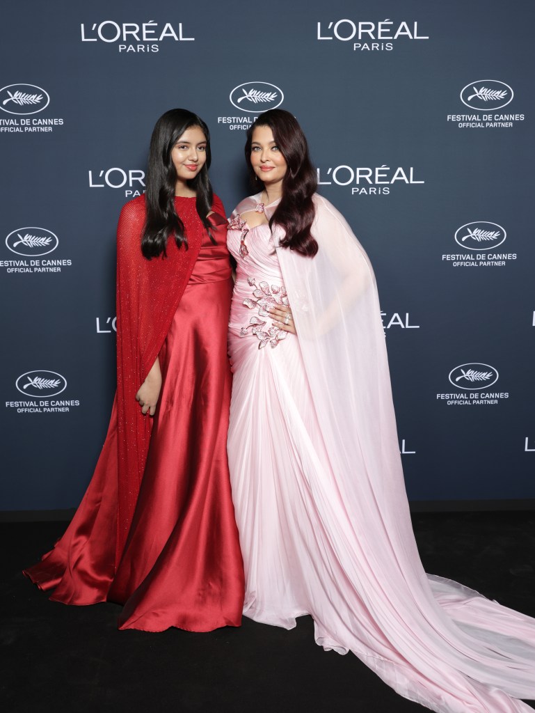 Aaradhya Bachchan and Aishwarya Rai Bachchan attend Lights On Women's Worth during the 79th Cannes Film Festival 