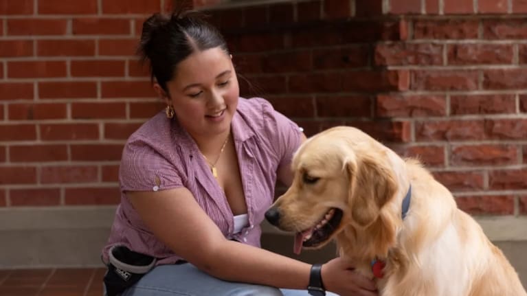 Amelia Guest and her service dog Sammy