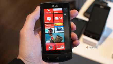 An LG Windows Phone in hand.