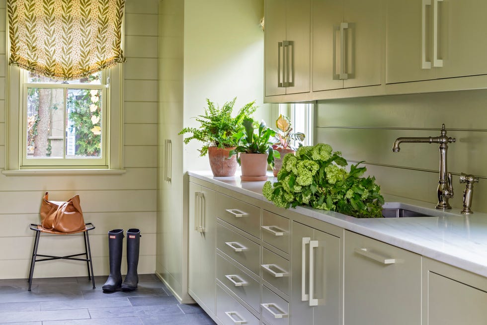 Angie Hranowsky Ohio House Utility Room utility room with light green cabinets