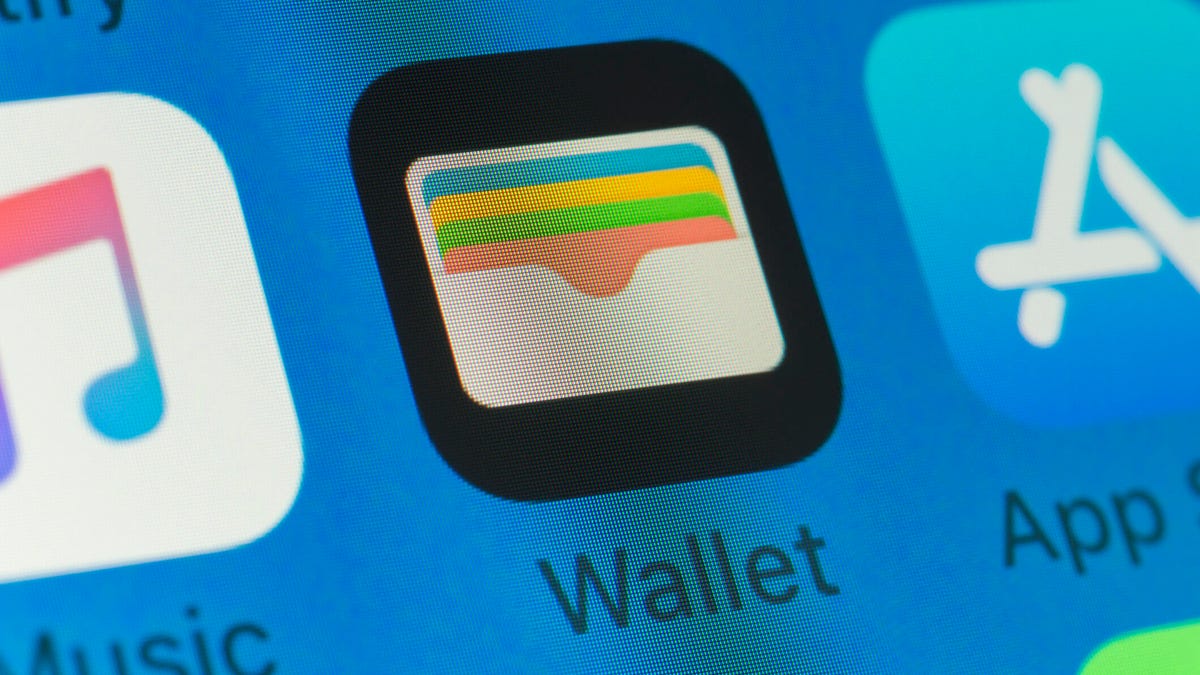Apple Wallet icon is shown on a smartphone