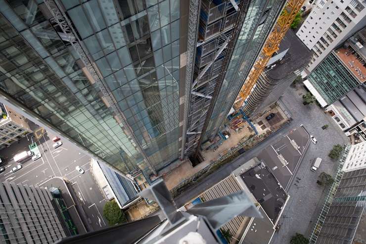 The partially built Seascape apartment tower, left, in Auckland CBD is looking for a new owner. Photo / Michael Craig